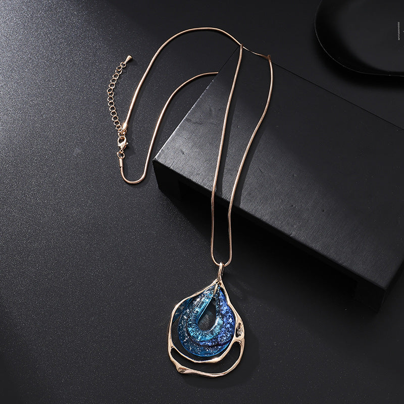 New 2024 European and American light luxury fashion versatile high-end hollow irregular water drop pendant women's long necklace