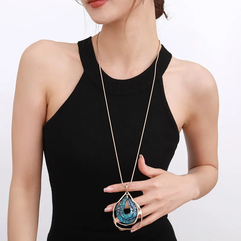 New 2024 European and American light luxury fashion versatile high-end hollow irregular water drop pendant women's long necklace