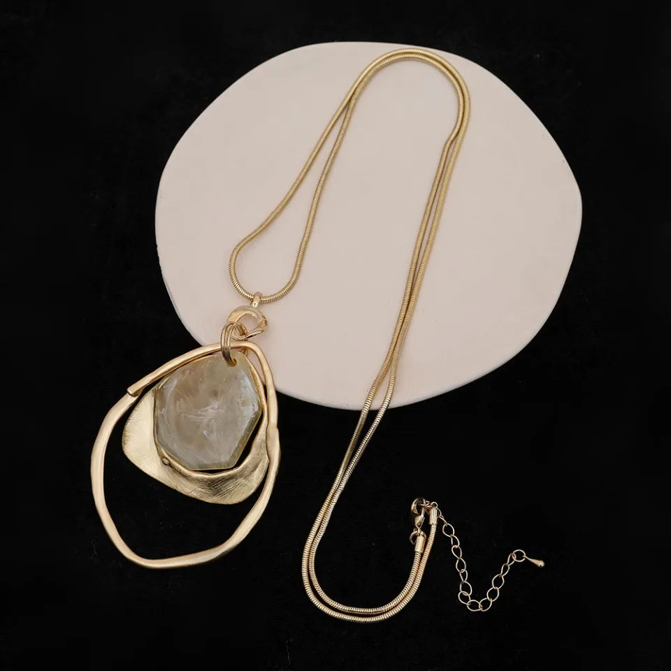 New 2024 European and American light luxury fashion versatile high-end hollow irregular water drop pendant women's long necklace