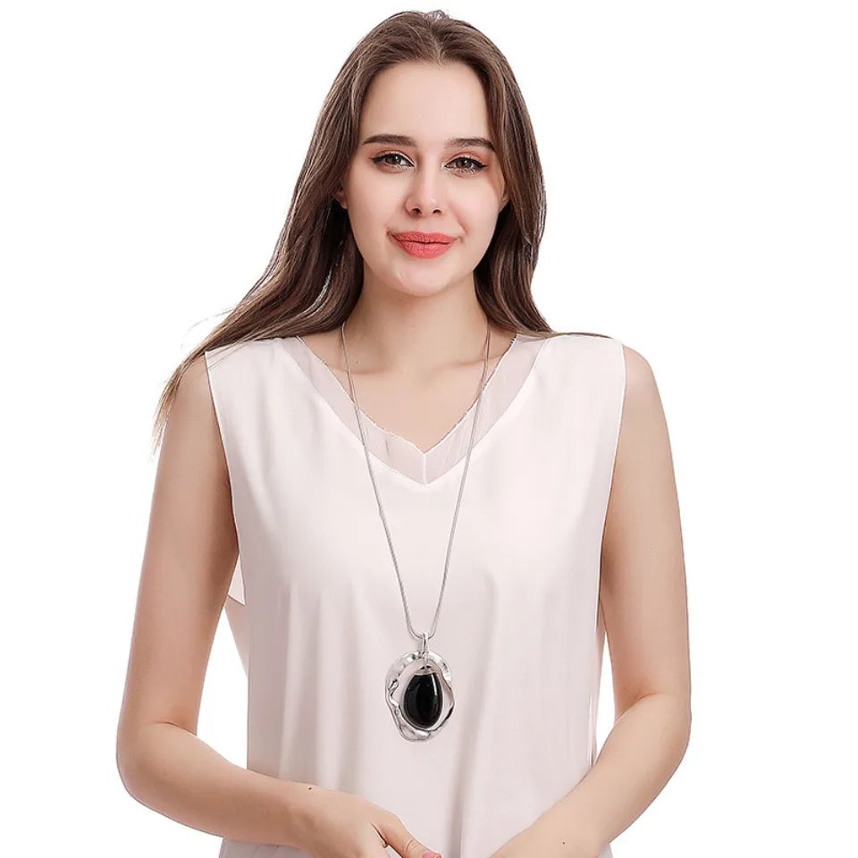 New 2024 European and American light luxury fashion versatile high-end hollow irregular water drop pendant women's long necklace