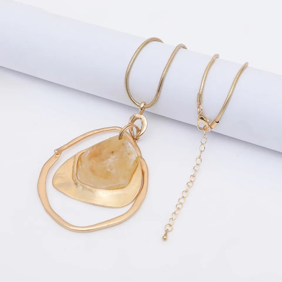 New 2024 European and American light luxury fashion versatile high-end hollow irregular water drop pendant women's long necklace