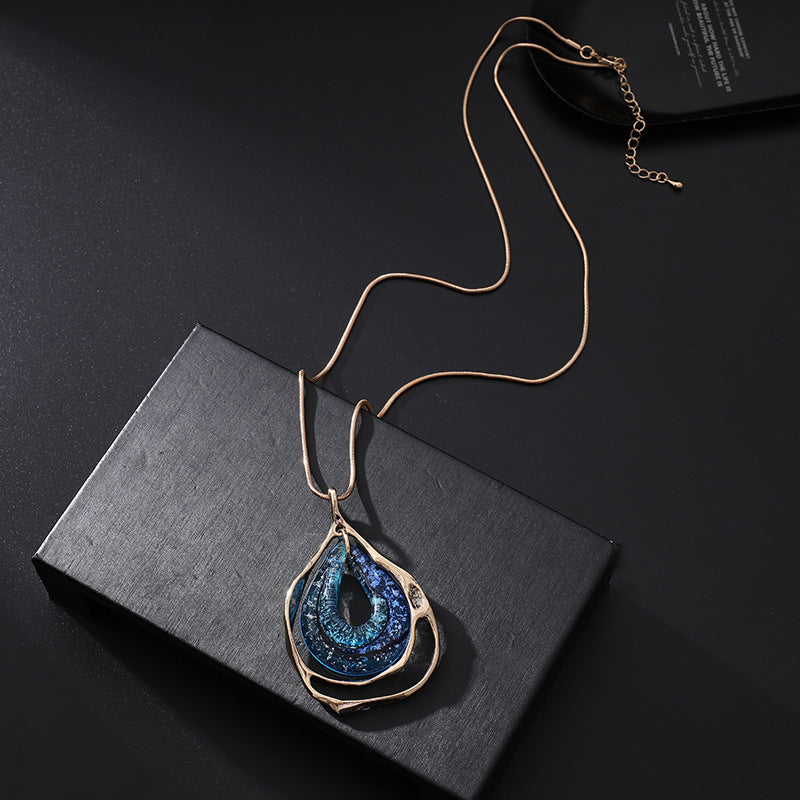 New 2024 European and American light luxury fashion versatile high-end hollow irregular water drop pendant women's long necklace